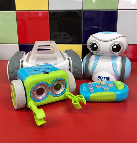 Botley and Artie the library coding robots